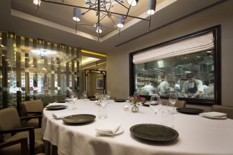 Murano By Angela Hartnett Private Dining Room Image View Of Chefs In Kitchen Through Glass Window 1