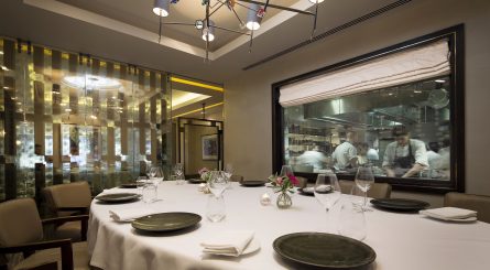 Murano By Angela Hartnett Private Dining Room Image View Of Chefs In Kitchen Through Glass Window 1