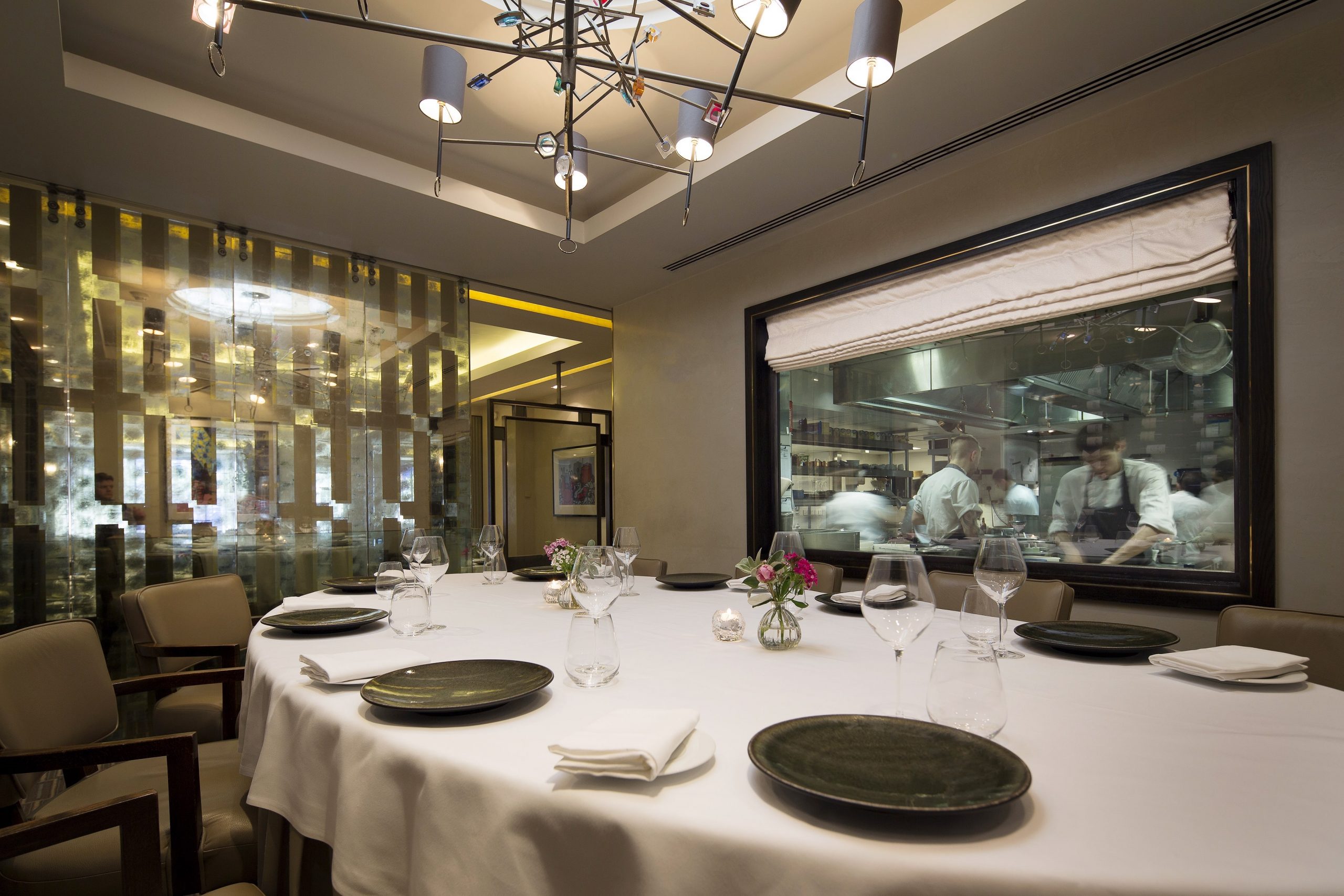 Murano By Angela Hartnett Private Dining Room Image View Of Chefs In Kitchen Through Glass Window Scaled